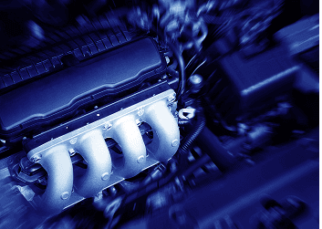 Close-up of a car engine intake system during filter service