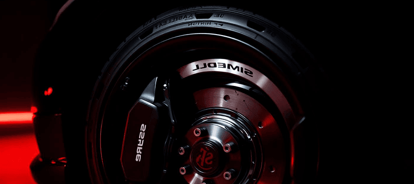 Close-up of a car wheel showing brake rotor and caliper