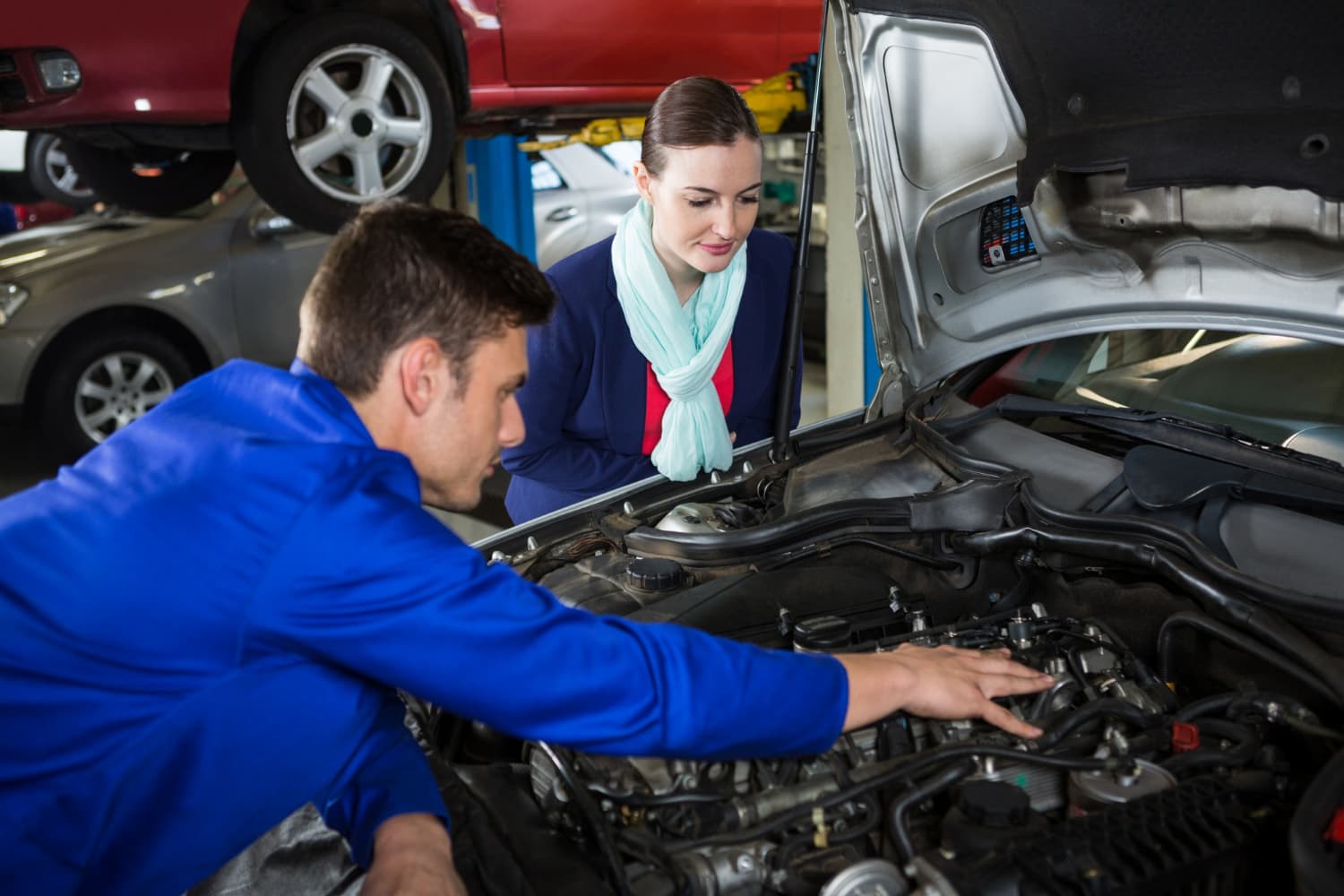 Mechanic and customer at Ten Minute Oil Change in Garland