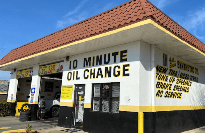 Ten Minute Oil Change Garland shop exterior with service bay signage