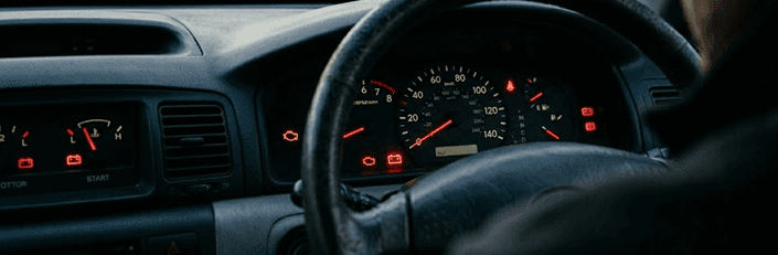 Dashboard warning lights indicating battery or electrical issues