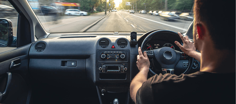 Driver on the road with a clear view through the windshield
